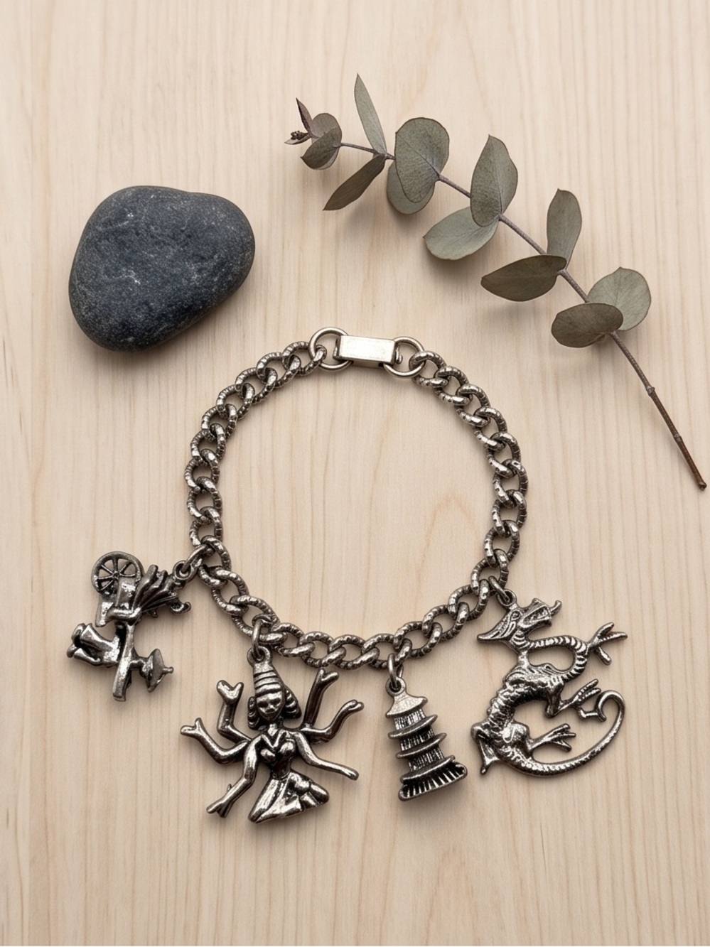 Vtg. Silver Tone Symbolic Charm Bracelet
Hindu Deity, Buddhist Pagoda, Chinese
